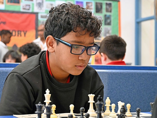  This is a photo of a student playing chess